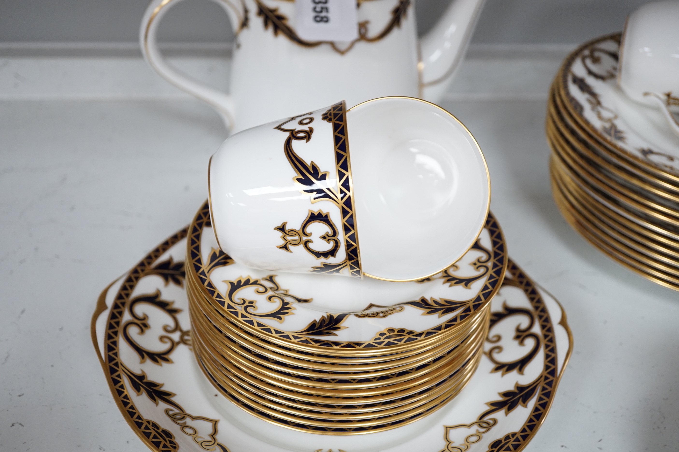A Royal Crown Derby Majesty pattern service, largest 26cm wide